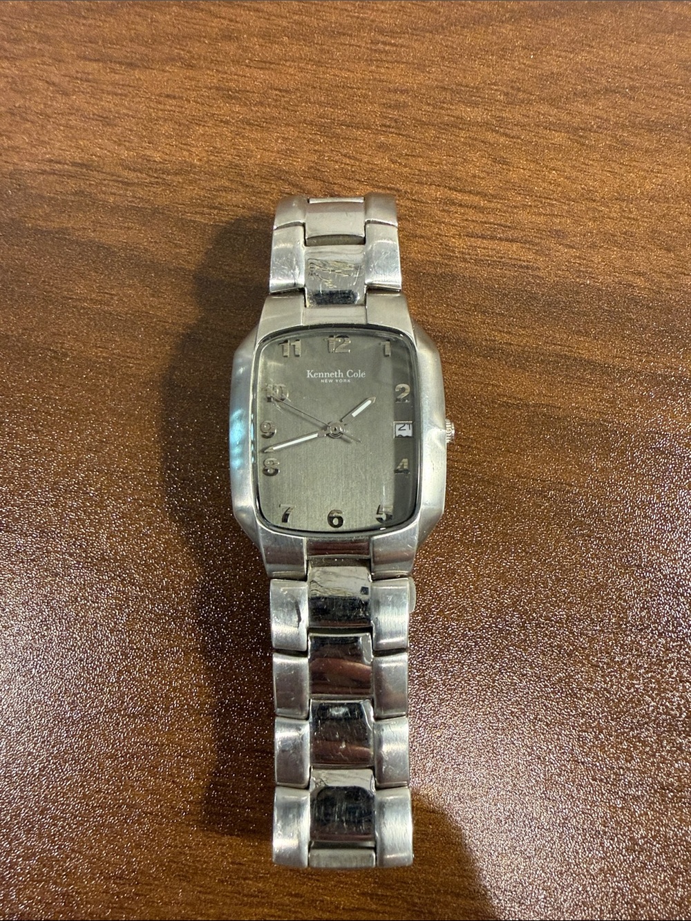 Watch on wooden surface